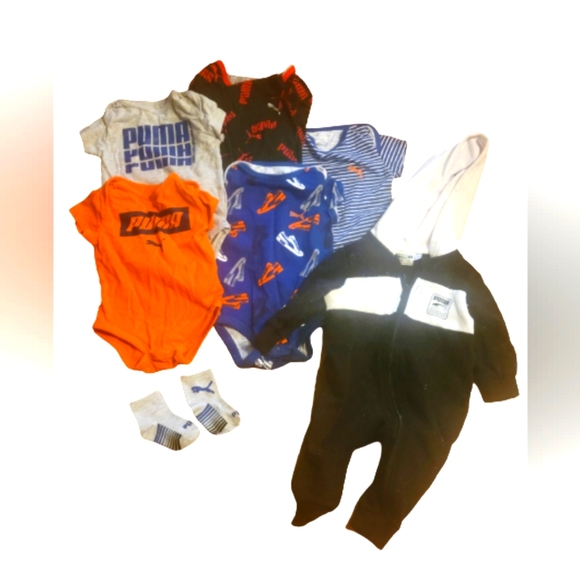 Puma onesies.5 count. 1 pr socks. One onesie hoodie with pants. 3-6 months.